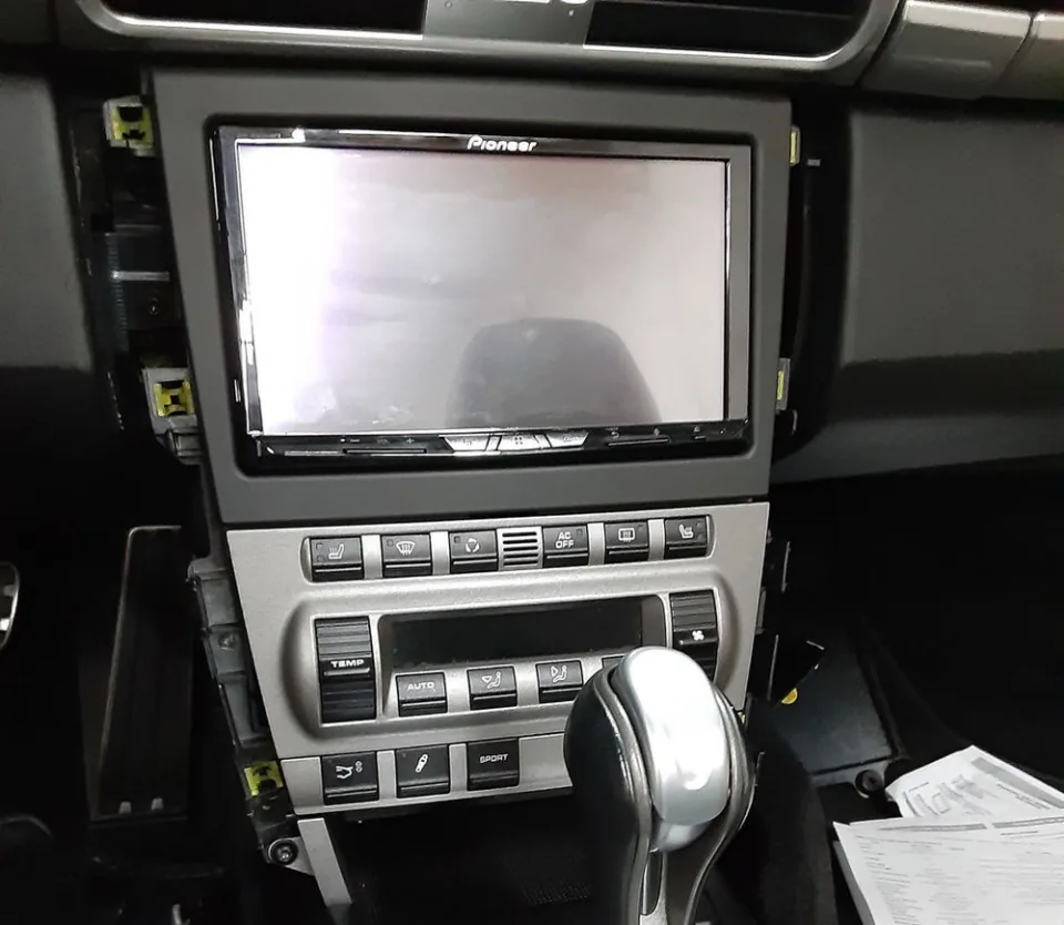 Stereo head unit fitment with surrounding trim still removed at Conexion